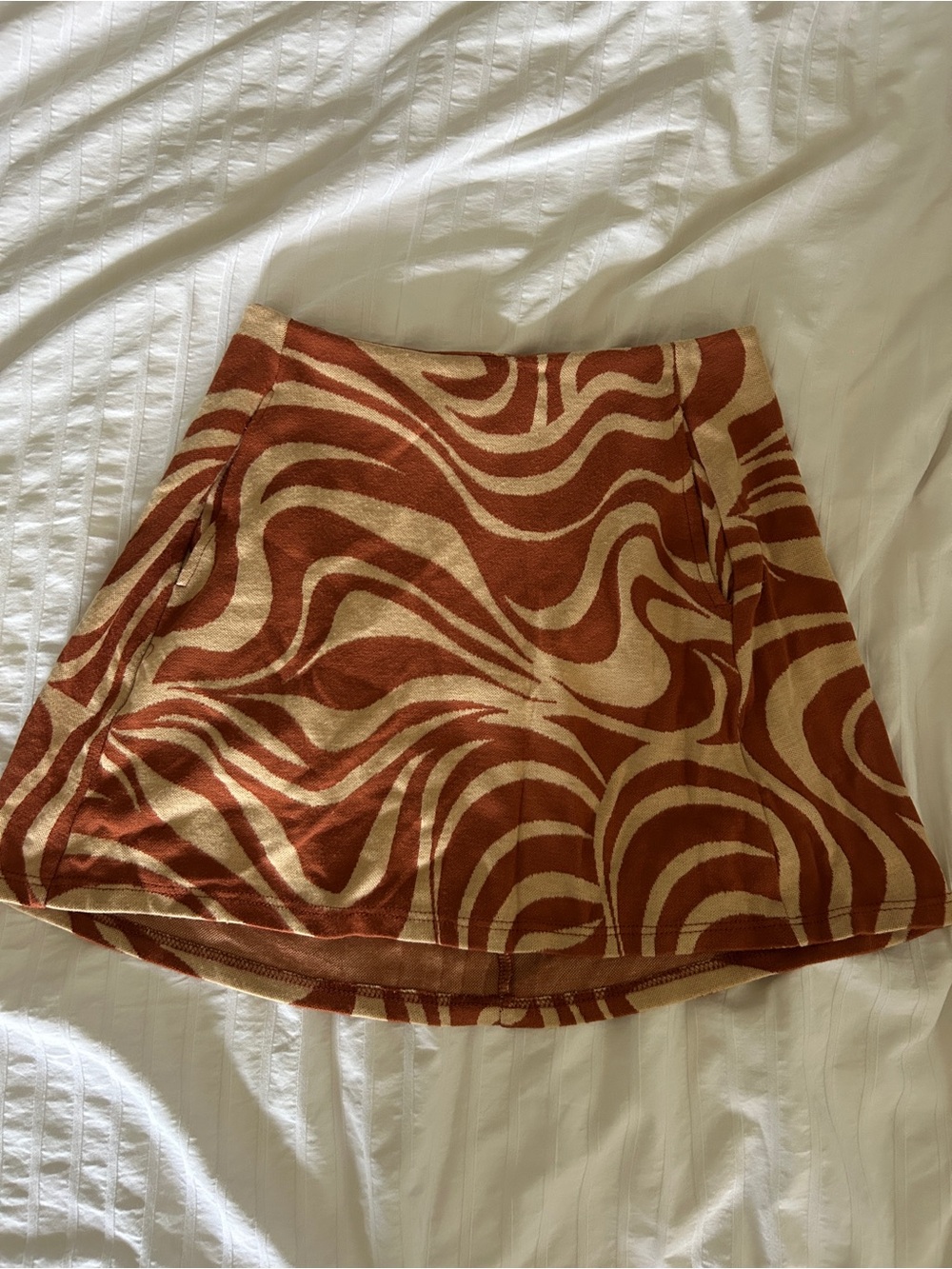 Altar'd State Swirl-Print Mini Skirt in Brown and Cream with pockets